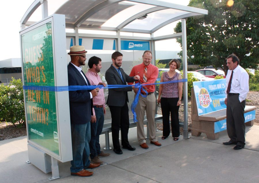 Ribbon cutting of new bus shelter with Metro board of directors